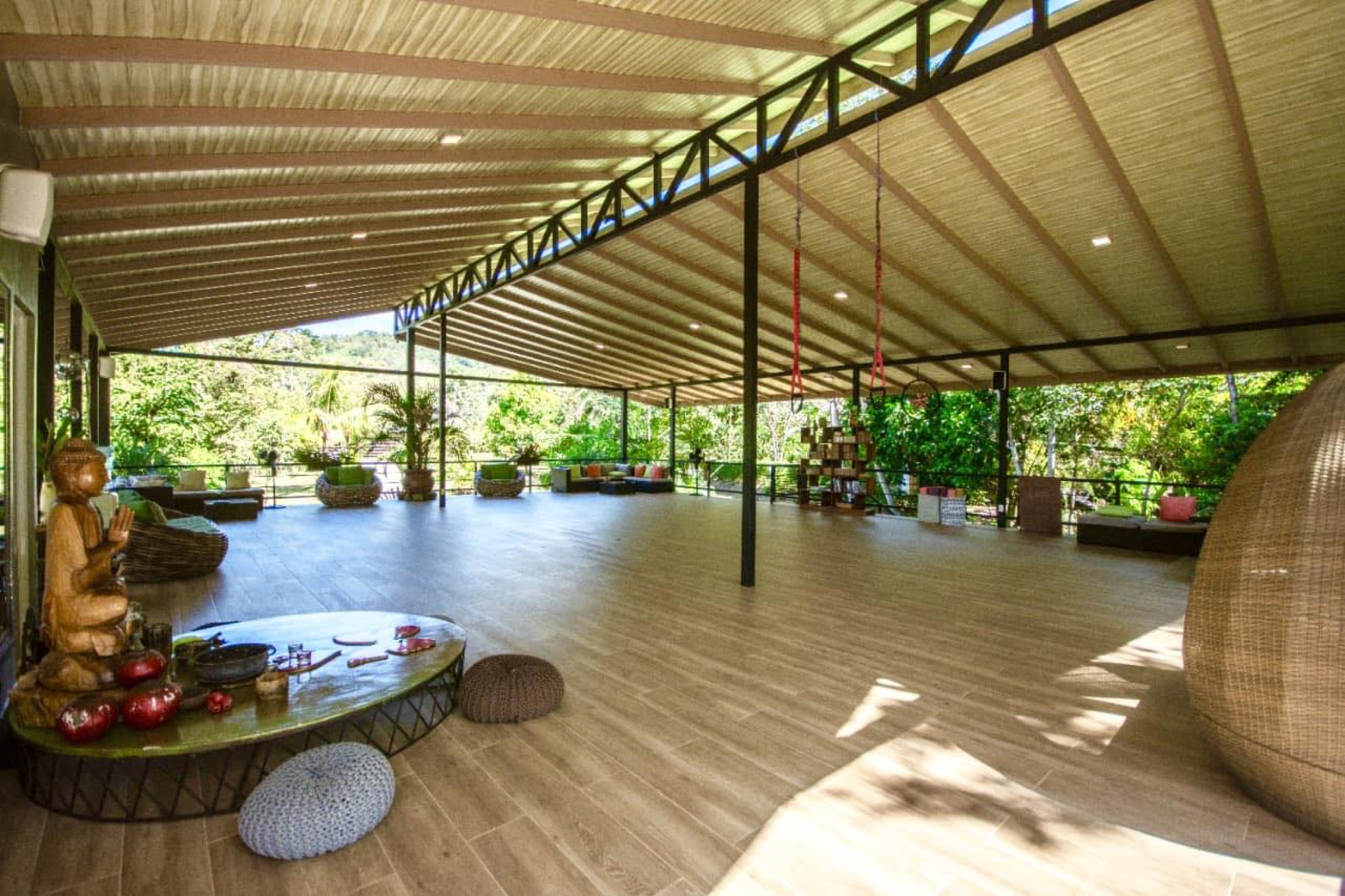 The 360-degree open-air yoga deck at Synergy, Uvita